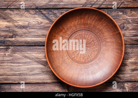empty bowl on a wooden background Stock Photo