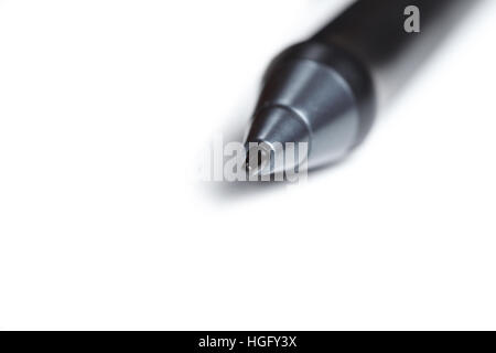 Close up shot of digital pen and nibs with penholder blured in the background Stock Photo