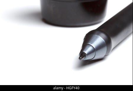 Close up shot of digital pen and nibs with penholder blured in the background Stock Photo