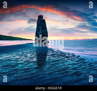 Huge basalt stack Hvitserkur on the eastern shore of the Vatnsnes peninsula. Colorful summer sunrise in northwest Iceland