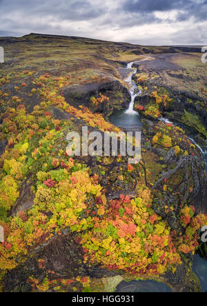 Aerial- lava and moss landscape in the autumn, Gjaarfoss Waterfalls, Thjorsardalur valley, Iceland. 'Drone Photography' Stock Photo