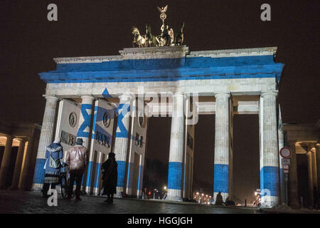 Berlin, Germany. 9th Jan, 2017. The Israeli national flag is projected on the Brandenburg Gate in solidarity with the victims of recent terror attack in Jerusalem. 4 IDF soldiers were killed and several others wounded as a Palestinian man rammed his truck through a group of Israeli soldiers on January 08, 2017. © Omer Messinger/ZUMA Wire/Alamy Live News Stock Photo