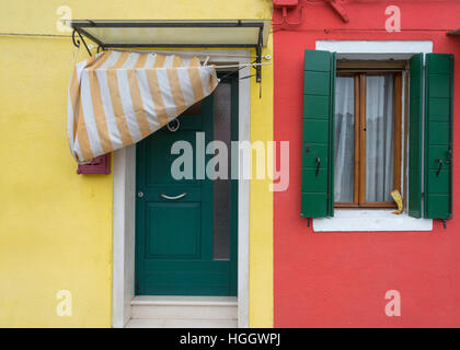 Colourful doorway and window on Burano, Venice, Italy Stock Photo