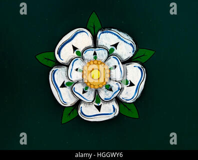 White rose of York painted on the exterior of a narrowboat. Stock Photo