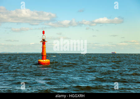 Navigation buoy at the edge of a fairway. Stock Photo