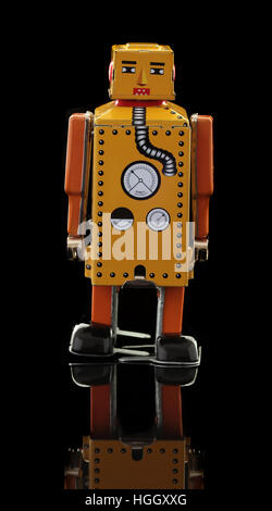 Retro Tin Robot on a Black Background Stock Photo