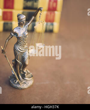 Legal law concept image, scales of justice with books in background Stock Photo