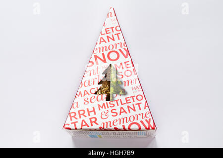 Box of M&S Christmas sticky toffee caramels isolated on white background - for other side of box see image HG9XFF Stock Photo