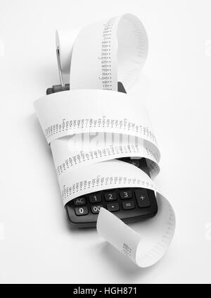 Calculator with roll of adding machine tape Stock Photo