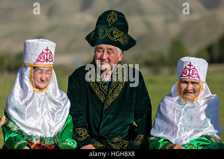 Kazakh man and women in national costumes. Stock Photo