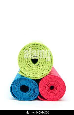 Close up view at exercise mats isolated on the white Stock Photo