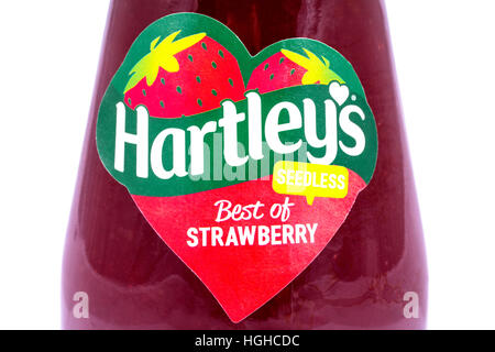 LONDON, UK - JANUARY 4TH 2017: A close-up of the label on a jar of Hartleys seedless Strawberry Jam over a white background. Stock Photo