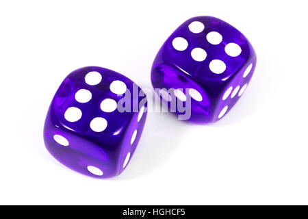 Two purple dice over a plain white background. Stock Photo