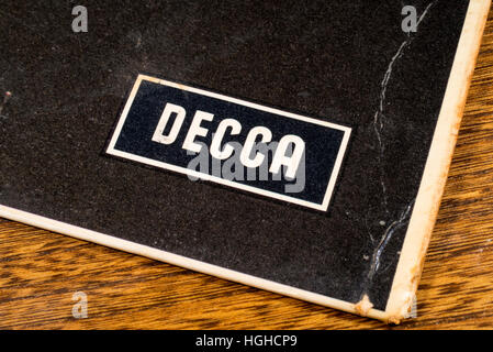 LONDON, UK - JANUARY 4TH 2017: A close-up shot of the Decca Records symbol on the corner of a vintage vinyl record cover. Stock Photo