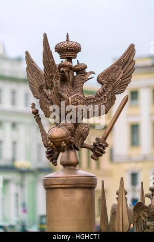 Two headed eagle coat of the arms of Russian empire on fence of Alexander column, Saint Petersburg, Russia Stock Photo