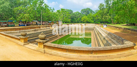 The archaeological site of Kuttam Pokuna - Twin Pools - the bathing tanks in Sacred City of Anuradhapura, Sri Lanka. Stock Photo