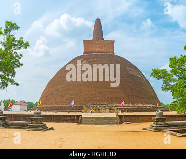 The impressive Abhayagiri Stupa, the major monastery site for different branches of Buddhism, located in Sacred City, Anuradhapura, Sri Lanka. Stock Photo