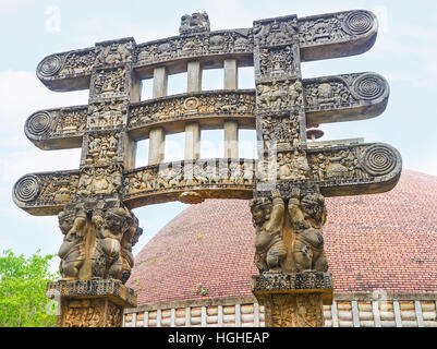 The dwarves hold the beams of Torana Gate of Stupa in Mihintale, that is the replica of Great Sanchi Stupa, Sri Lanka. Stock Photo