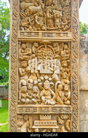 The Torana Gate of Great Sanchi Stupa's replica in Mihintale decorated with panel, depicting Bodhi Tree and Naga-Raja Goddess with five cobras above t Stock Photo