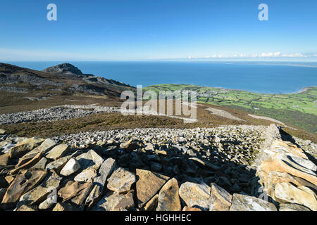 Tre'r Ceiri Ancient Iron age Hill fort  from the Llyn coastal path Llithfaen on the Lleyn Peninsula  North Wales UK Stock Photo