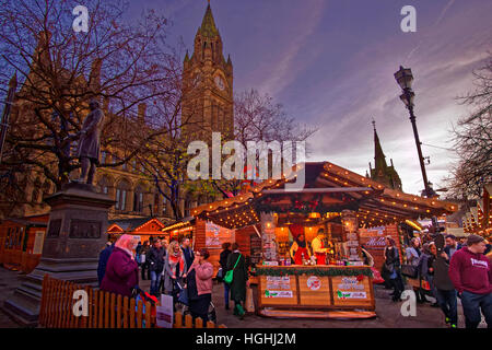 Manchester Christmas Market and Town Hall at Albert Square, Manchester Town Centre, Greater Manchester. England, UK. Stock Photo