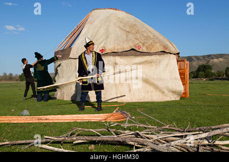 Nomadic people build a yurt in Saty Village, Kazakhstan Stock Photo