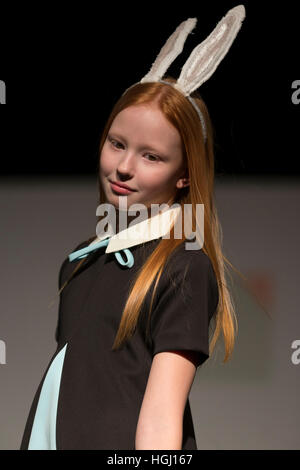 New York, USA. 09th Jan, 2017. Young girl walks runway for petitePARADE at Childrens Club UBM show for Aisabobo at Jacob Javits Center in New York © Lev Radin/Pacific Press/Alamy Live News Stock Photo