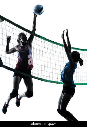 two caucasian women volleyball in studio silhouette isolated on white background Stock Photo