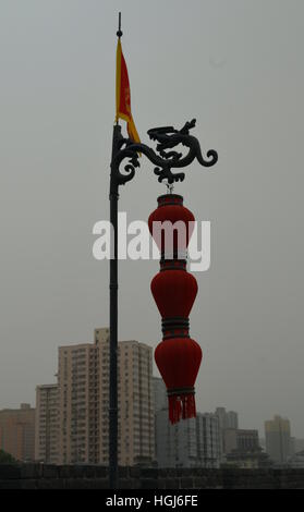 Red flag flying in a smog day