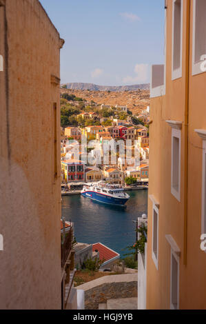 Looking down at boats in the harbour in Yialos on Symi Greece Stock Photo