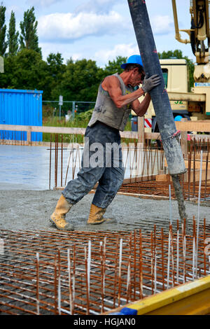 construction site pouring concrete Stock Photo