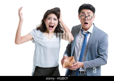 Shocked young couple with empty wallet Stock Photo