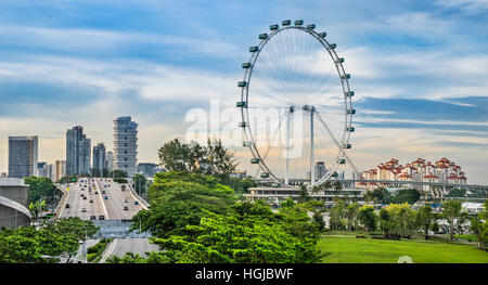 Singapore, view of the ECP (East Coast Parkway), the Marina Centre highrise, the Singapore Flyer ferris wheel and the Costa Rhu housing estate Stock Photo