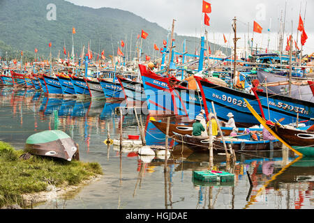 Colorful commercial fishing boats anchored in protected Da Nang harbor. Stock Photo