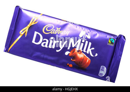 A large bar of Cadbury Dairy Milk Chocolate on a white background Stock Photo