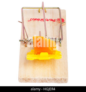 A mousetrap baited with cheese on a white background Stock Photo