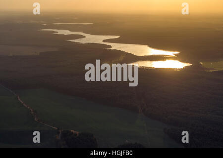 Aerial view, seascape, in evening backlight shines the Zirtowsee and Rätzsee and Peetschsee, Wesenberg,Mecklenburg Lake District Stock Photo