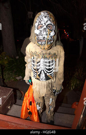 Skeleton mummy ghoul out for a scary night of Halloween trick or treats. St Paul Minnesota MN USA Stock Photo