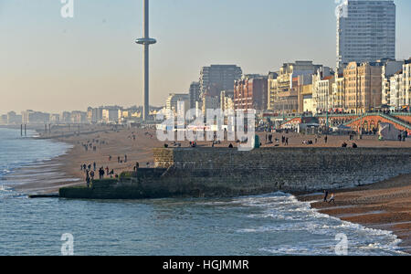 Brighton Sussex, UK. 22nd Jan, 2017. Visitors enjoy the beautiful sunny but cold weather on Brighton seafront today Credit: Simon Dack/Alamy Live News Stock Photo