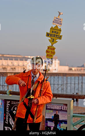 Brighton Sussex, UK. 22nd Jan, 2017. The well known Birdyman who sells bird call whistles enjoys the beautiful sunny but cold weather on Brighton seafront today Credit: Simon Dack/Alamy Live News Stock Photo