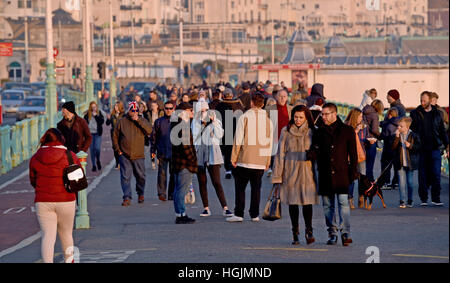 Brighton Sussex, UK. 22nd Jan, 2017. Visitors enjoy the beautiful sunny but cold weather on Brighton seafront today Credit: Simon Dack/Alamy Live News Stock Photo