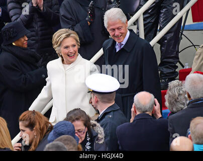 Washington, Us. 20th Jan, 2017. Former United States Secretary of State Hillary Rodham Clinton and her husband, former US President Bill Clinton arrive for the swearing-in ceremony as Donald J. Trump is sworn-in as the 45th President of the United States on the West Front of the US Capitol on Friday, January 20, 2017. Credit: Ron Sachs/CNP (RESTRICTION: NO New York or New Jersey Newspapers or newspapers within a 75 mile radius of New York City) - NO WIRE SERVICE - Photo: Ron Sachs/Consolidated/dpa/Alamy Live News Stock Photo