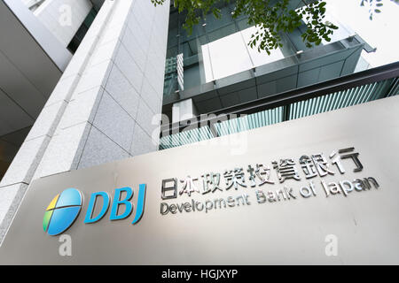 A Development Bank of Japan signboard on display outside its head office building on January 23, 2017, Tokyo, Japan. The Development Bank of Japan is expected to step in to support Toshiba Corp. which faces a deficit of $6 billion on its US nuclear business. Toshiba has already begun arrangements to sell part of its core chip business and complete a stake sale by the end of the financial year in March. Credit: Rodrigo Reyes Marin/AFLO/Alamy Live News Stock Photo