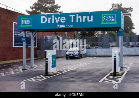 A Click and Collect drive through point at the Asda on Honey End Lan in Tilehurst, Reading, UK Stock Photo