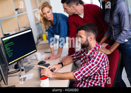 Programmer working in a software developing company office Stock Photo