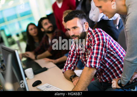 Programmer working in a software developing company office Stock Photo