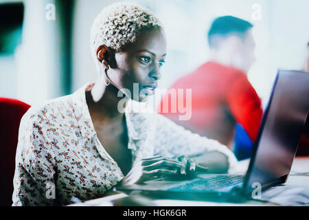 Female programmer working on IT project at company office Stock Photo