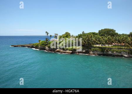 Cruising past beautiful landscape into the port of La Romana, Dominican Republic, Caribbean. Stock Photo