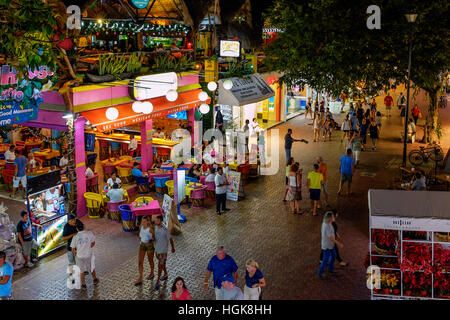 5th Avenue at Playa Del Carmen, Riviera Maya, near Cancun, Mexico.  At night showing some restaurants and bars. Stock Photo