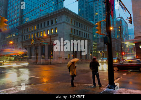 Vancouver, BC, Canada - December 9, 2016 - Early morning image of a busy and snowy intersection near Gastown.   Photo: © Rod Mountain Stock Photo